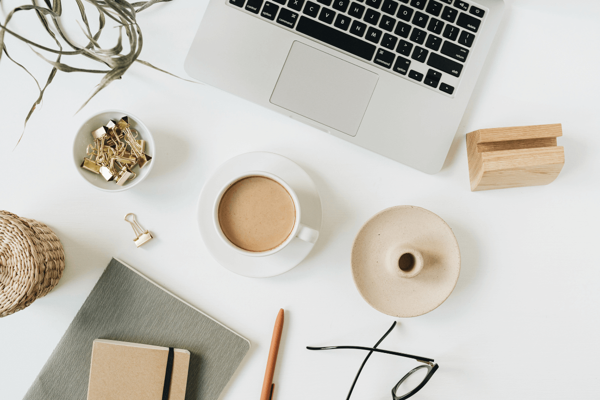 desk with laptop and coffee